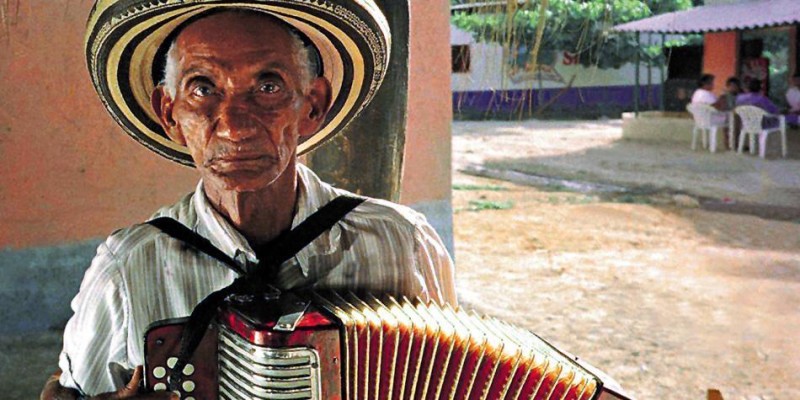 El diablo toca guitarra, arpa y acordeón